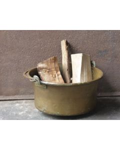 Antique brass log holder