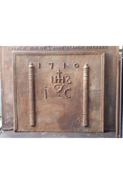 Pillars with IHS Monogram Fireback